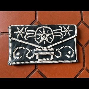 Jigsaw brand beautiful hand stitch leather clutch. Barley worn